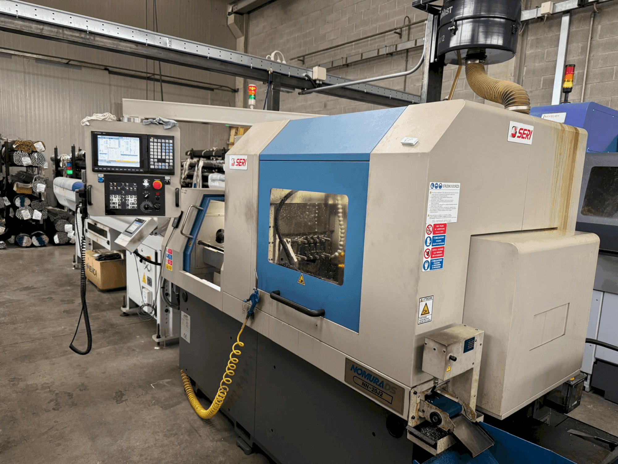 Vista frontal de la máquina NOMURA NN-20J2