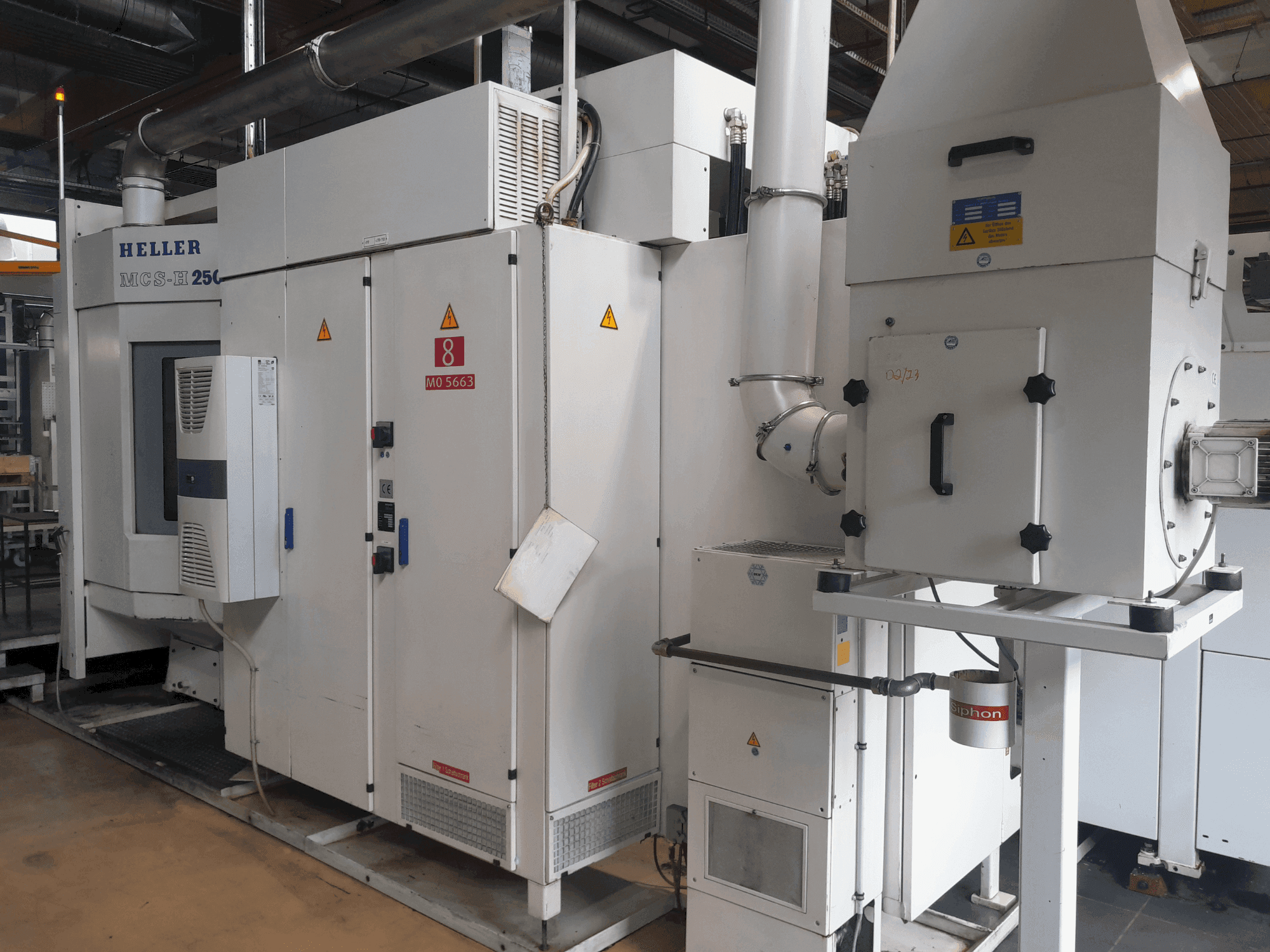 Vista frontal de la máquina HELLER MCS-H 250