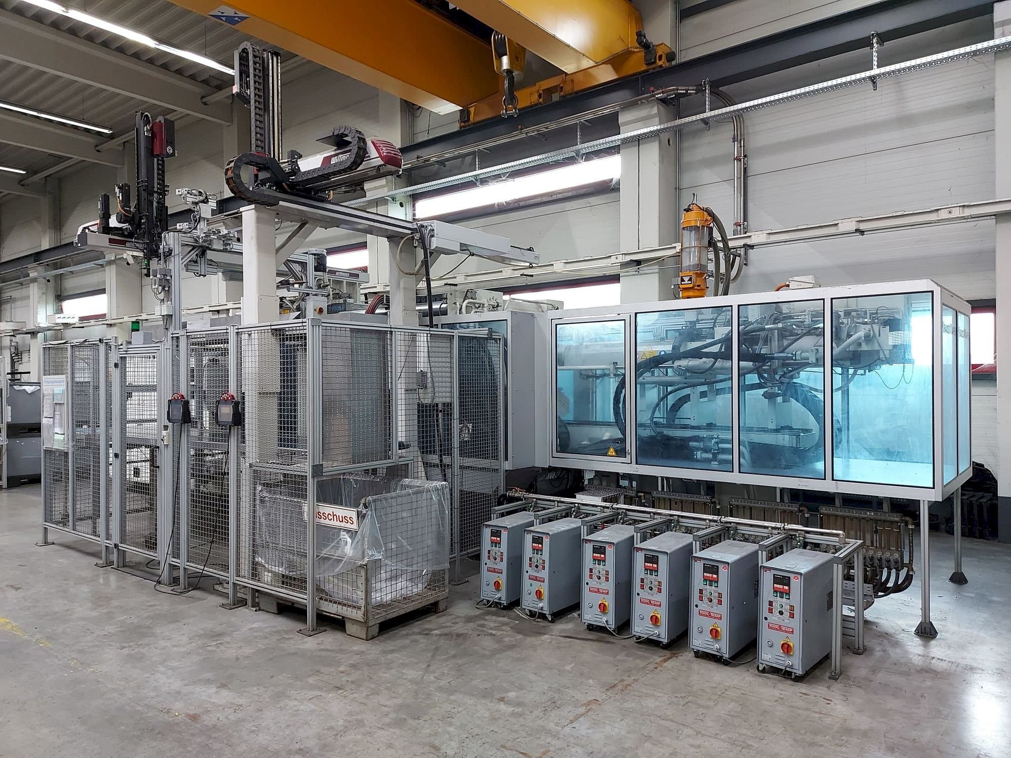 Vista frontal de la máquina Krauss Maffei 650 Tandem