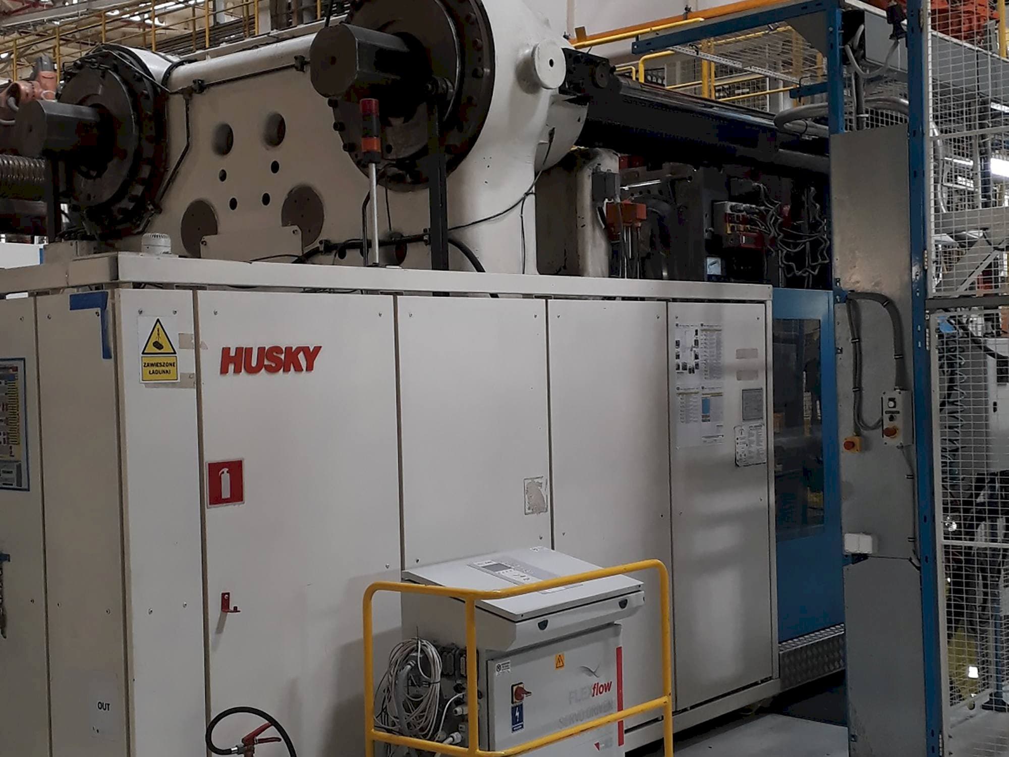 Vista frontal de la máquina Husky ELL2350 RS155/145