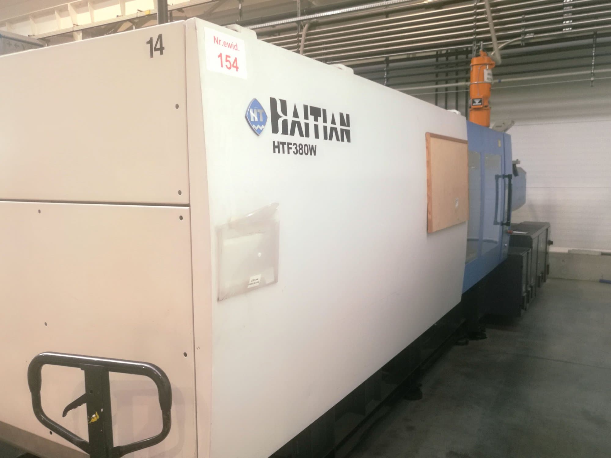 Vista lateral izquierda de la máquina HAITIAN HFT 380 W