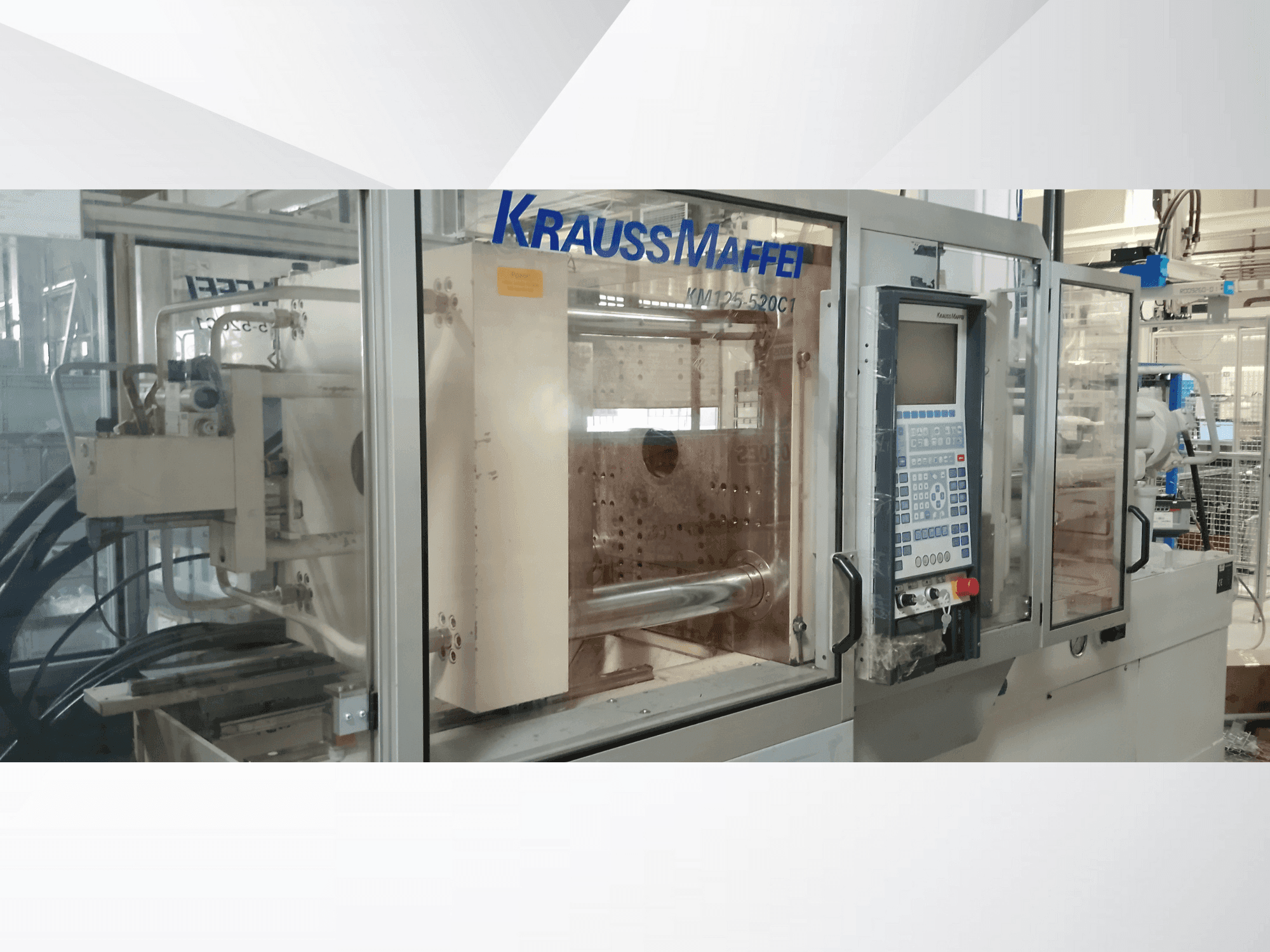 Vista frontal de la máquina Krauss Maffei 125-520 C1