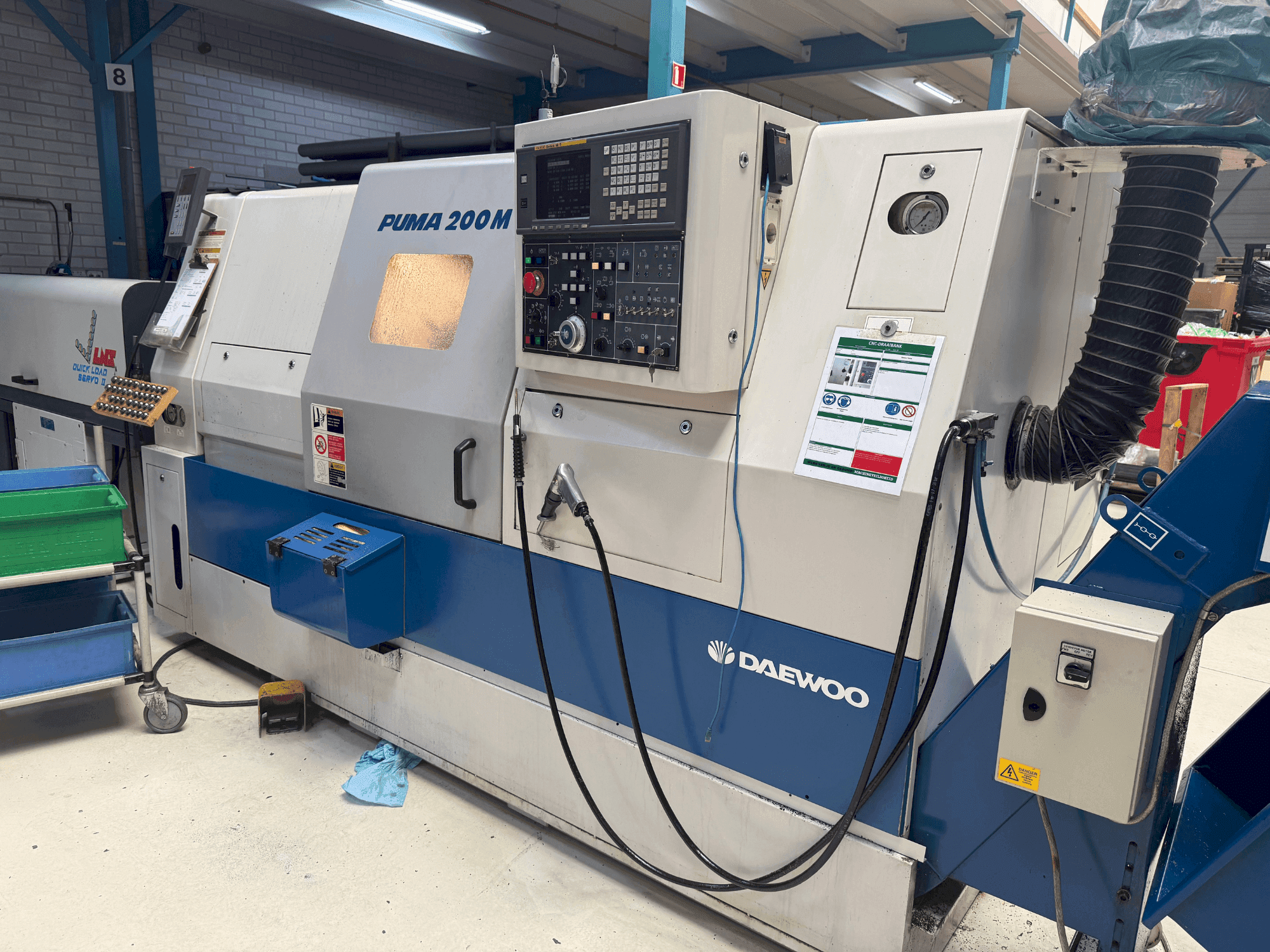 Vista frontal de la máquina DAEWOO Puma 200 LMC