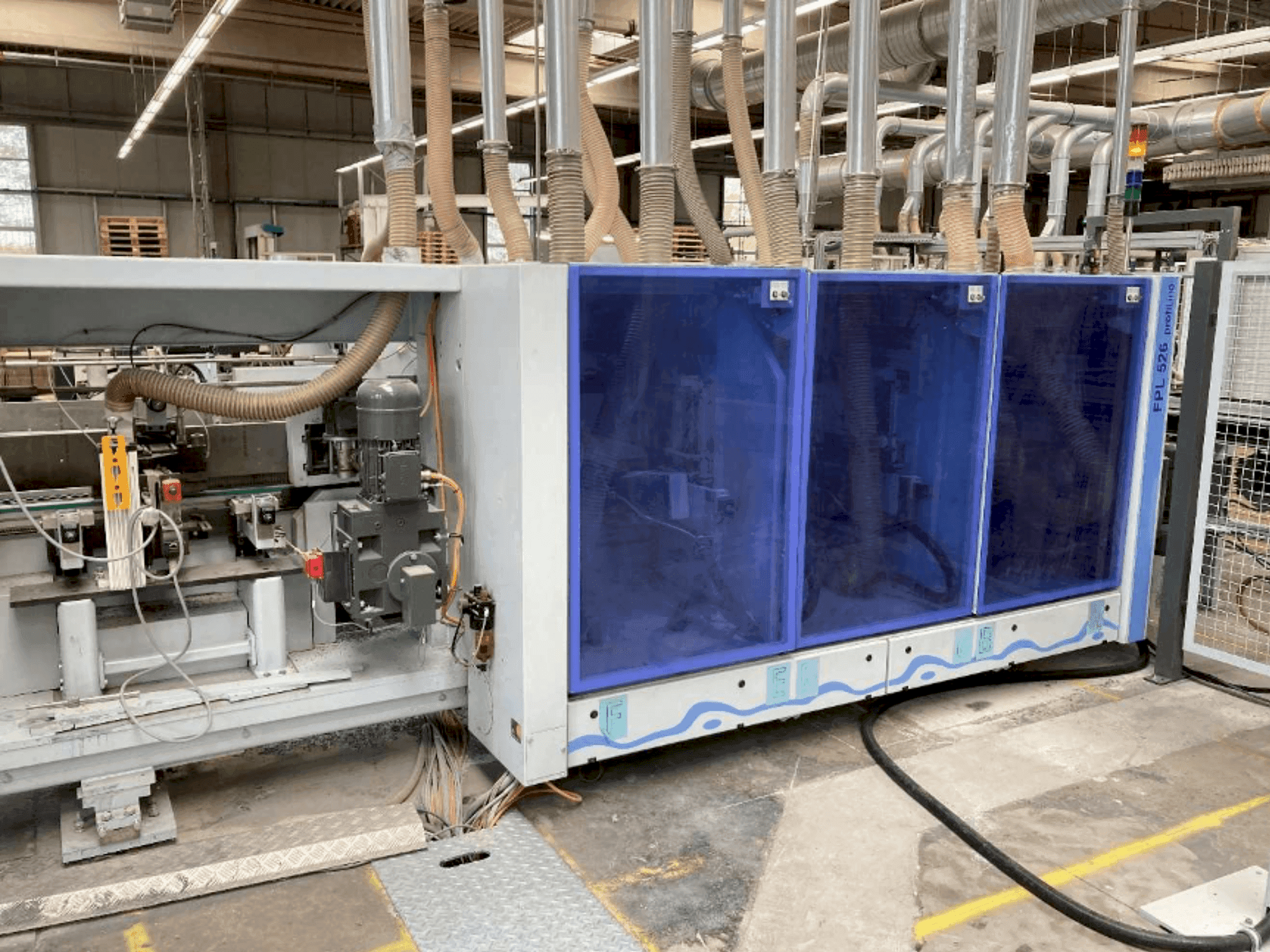 Vista frontal de la máquina HOMAG PROFI FPL 525/6/04/PW/V LVT Profiling System