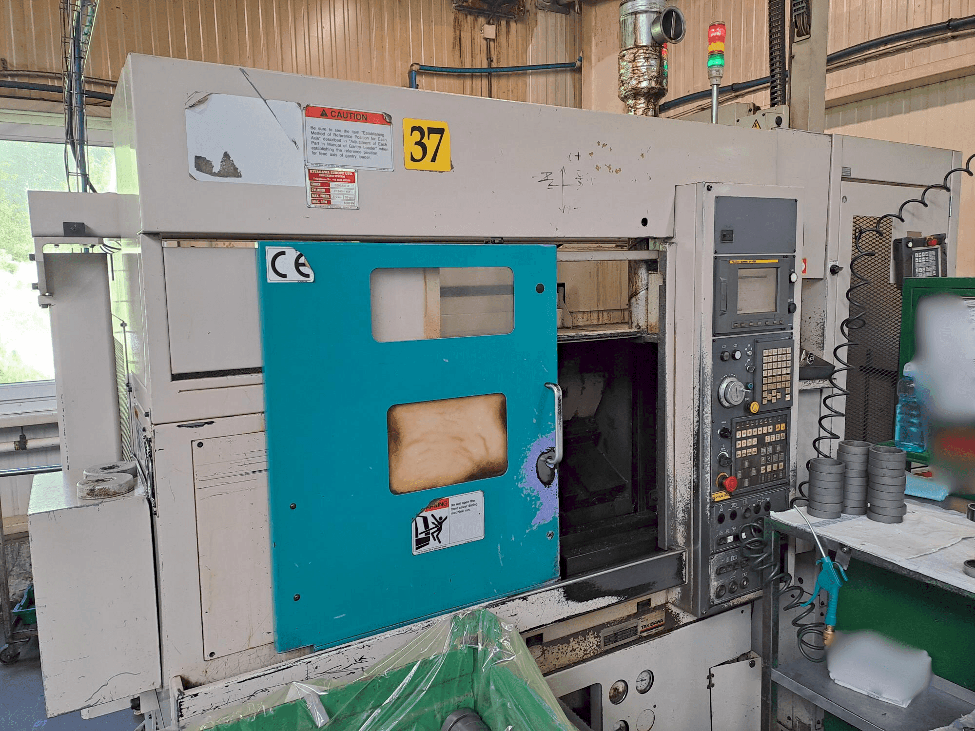 Vista frontal de la máquina Takisawa TC 200