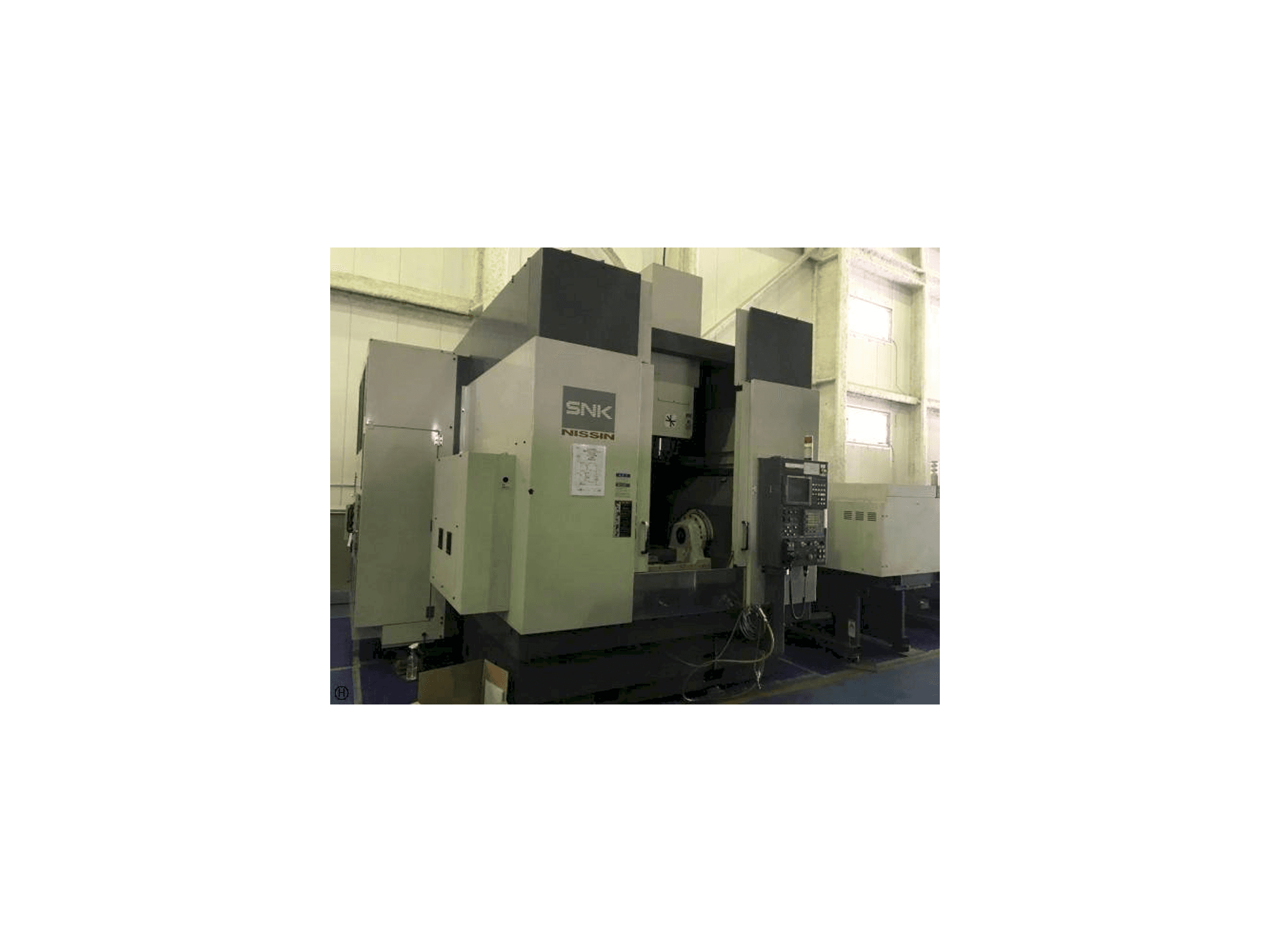 Vista frontal de la máquina SNK Nissin
