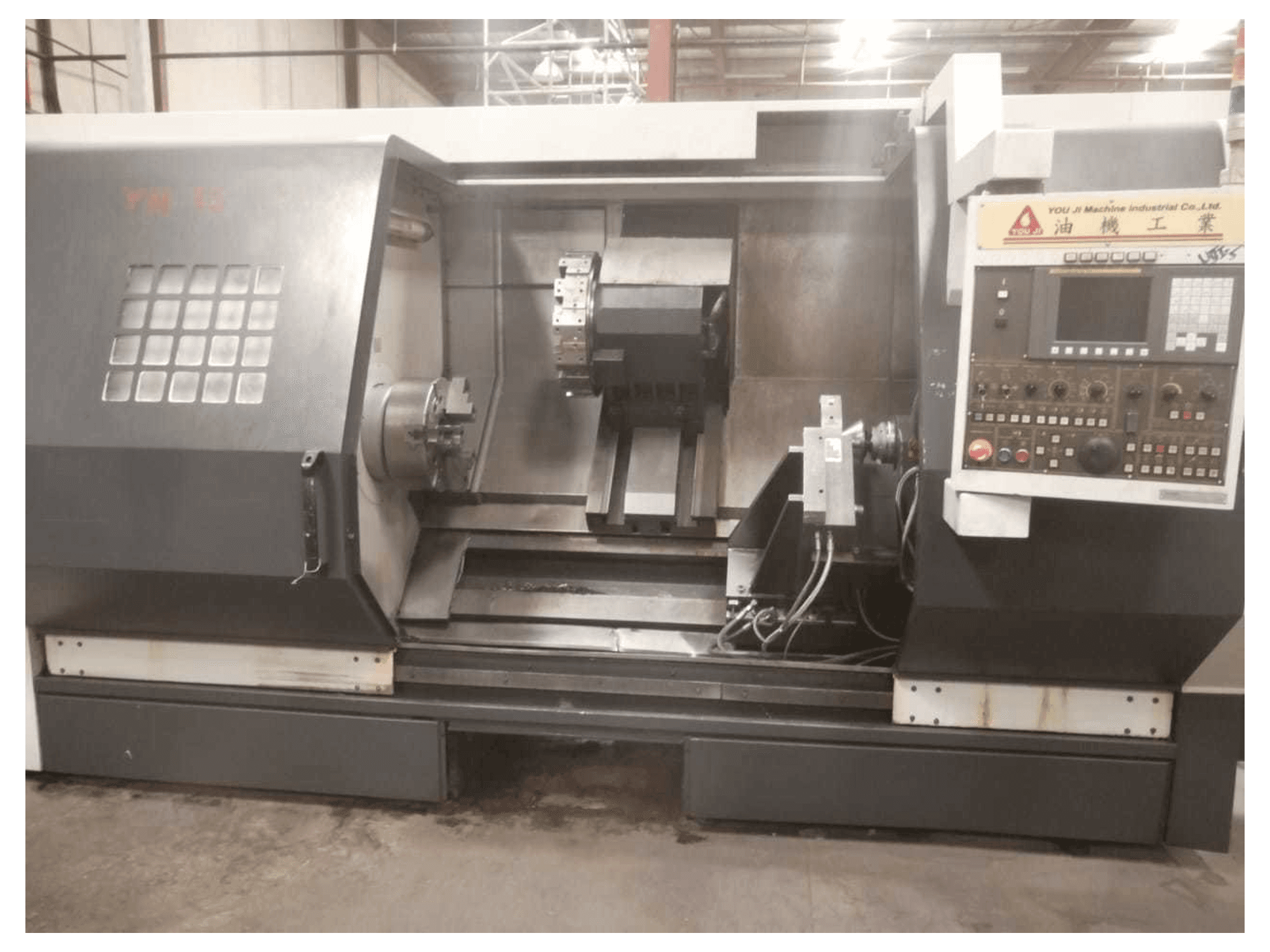 Vista frontal de la máquina YOU JI YH-36/135