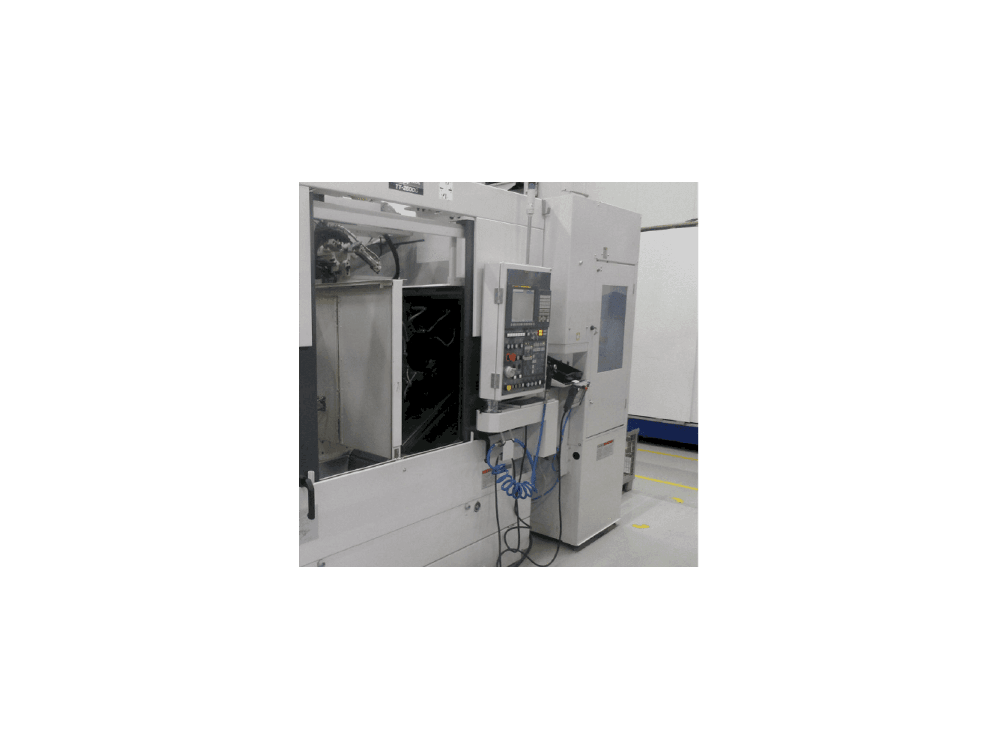 Vista frontal de la máquina Takisawa TT-2600G