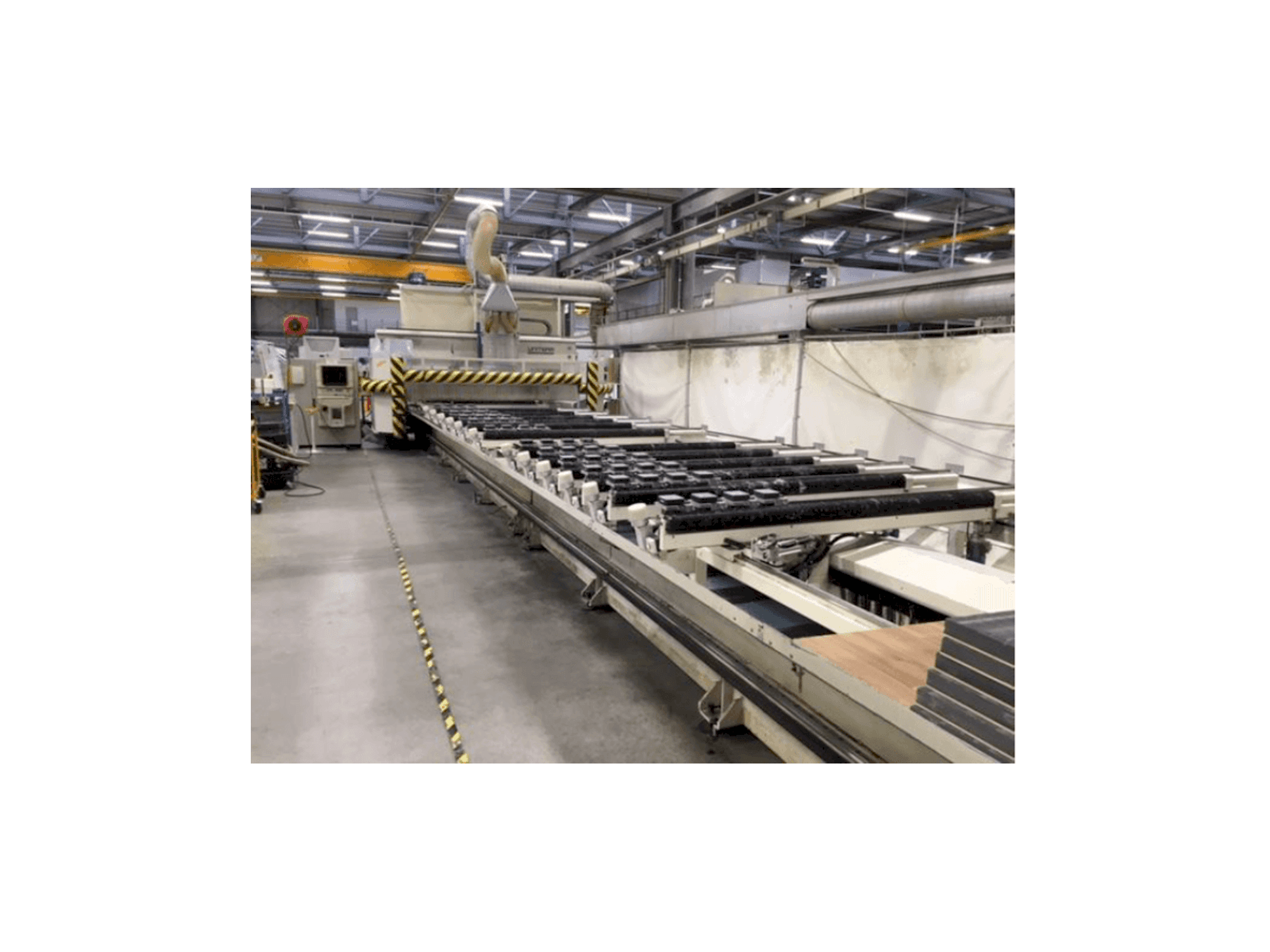 Vista lateral izquierda de la máquina Uniteam 5 achs