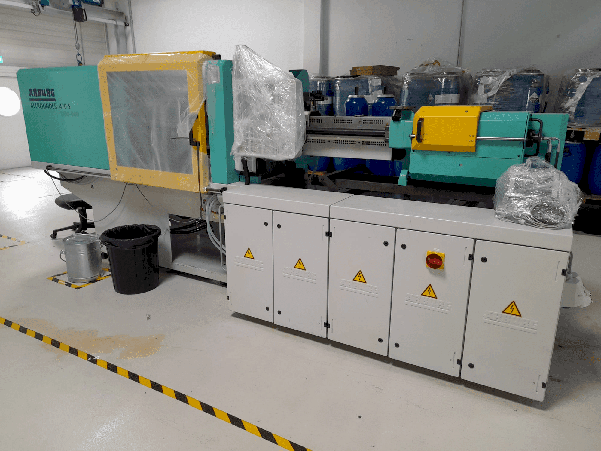 Vista frontal de la máquina Arburg Allrounder 470S 1100-400 with Multilift handling (2010)