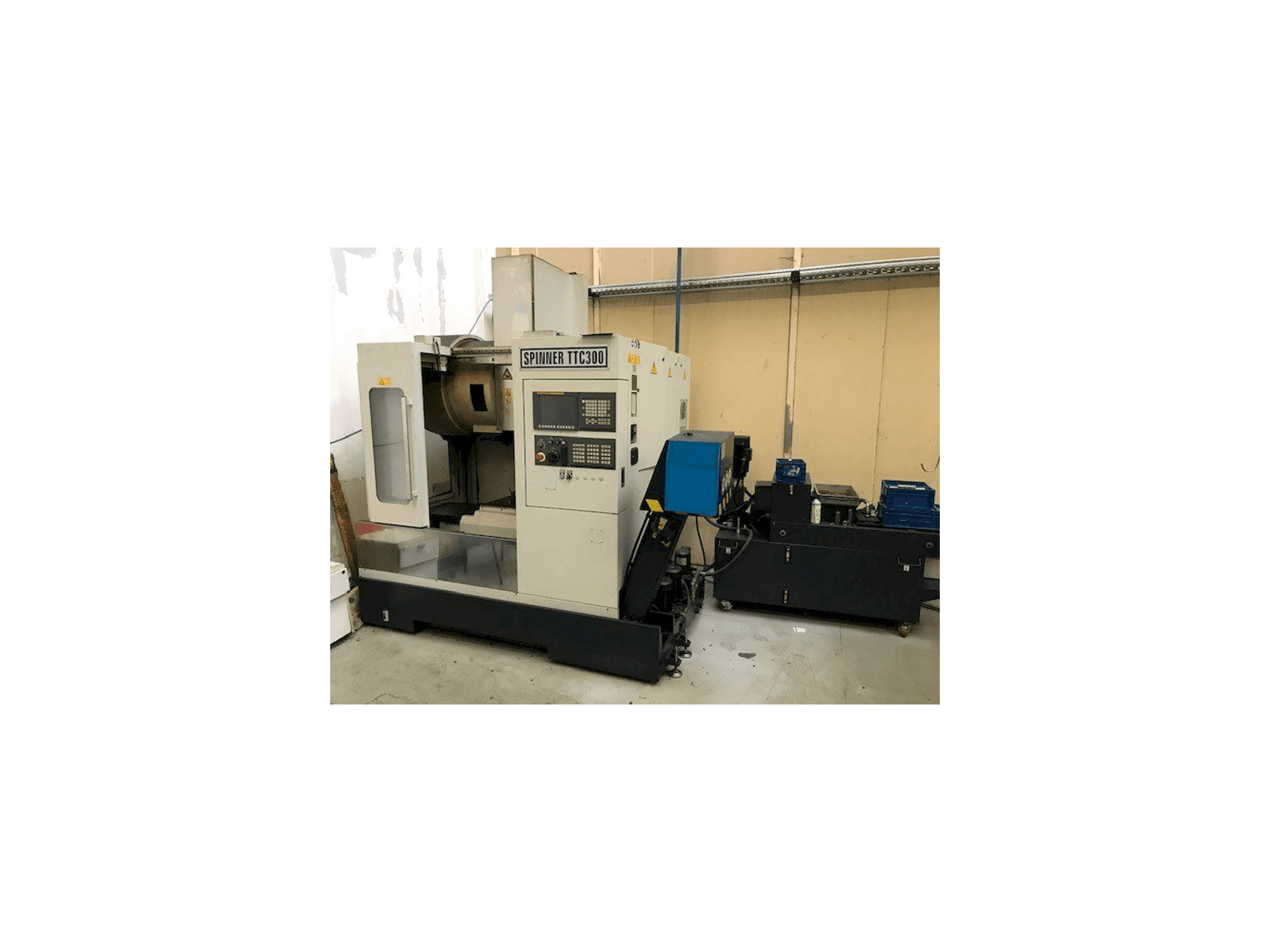 Vista frontal de la máquina SPINNER TTC300 52 SMMCY