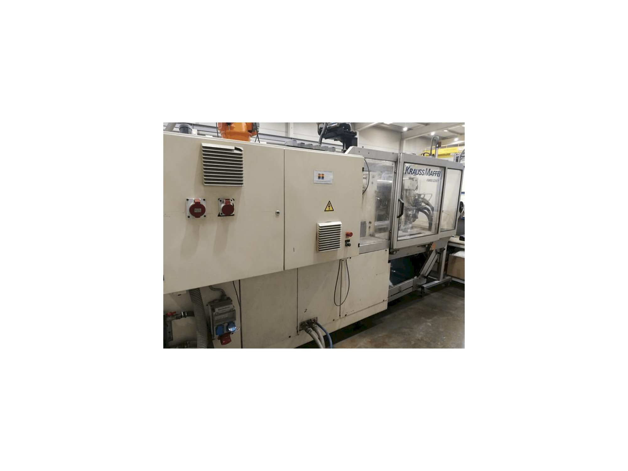 Vista frontal de la máquina Krauss Maffei 80/220 C1