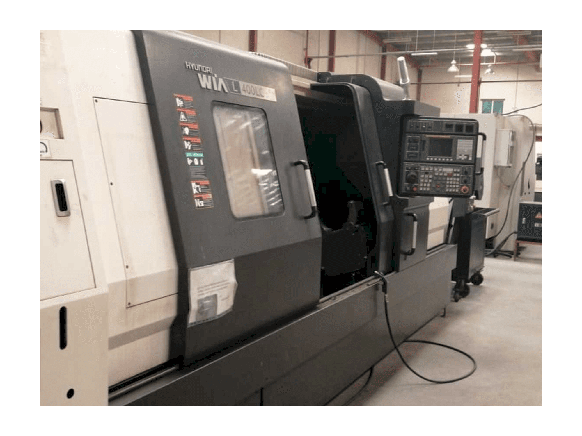 Vista lateral izquierda de la máquina Hyundai Wia L400LC