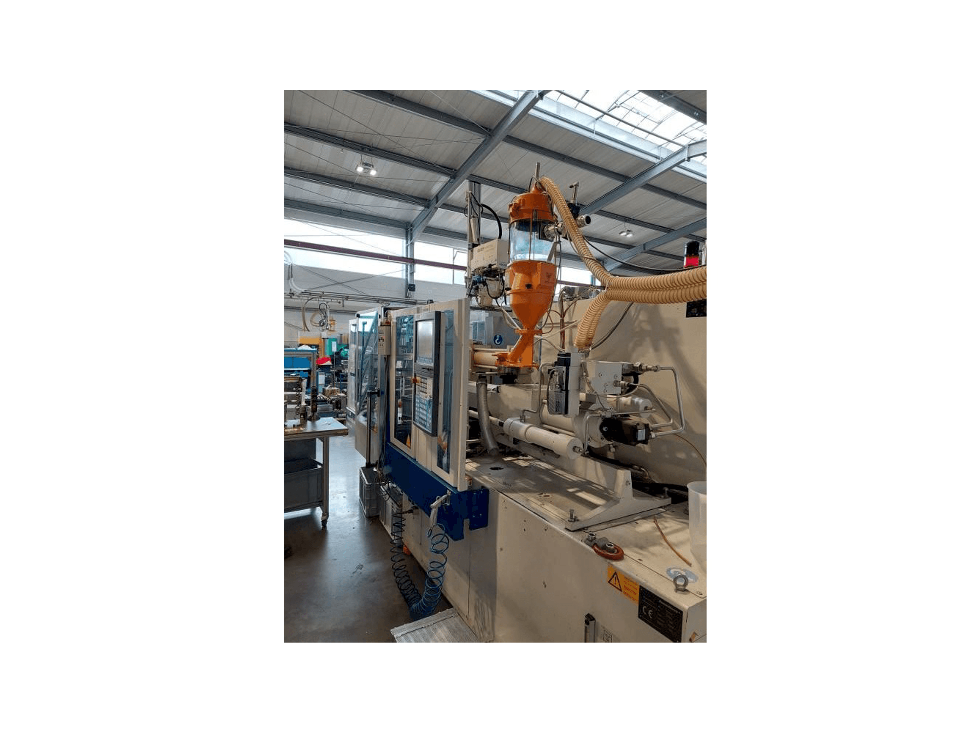 Vista frontal de la máquina Krauss Maffei 80-180 CX