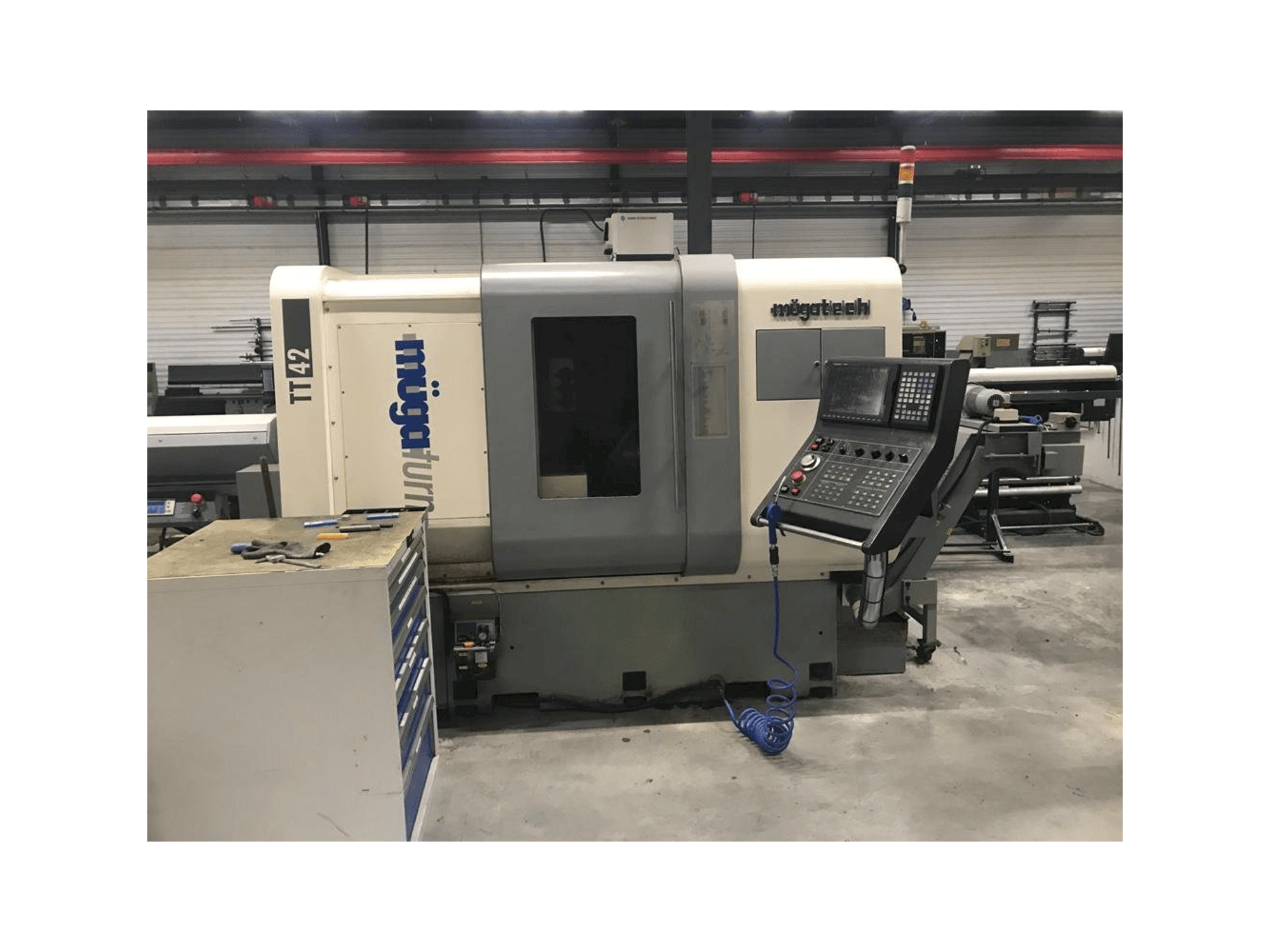 Vista frontal de la máquina Muga TT-42