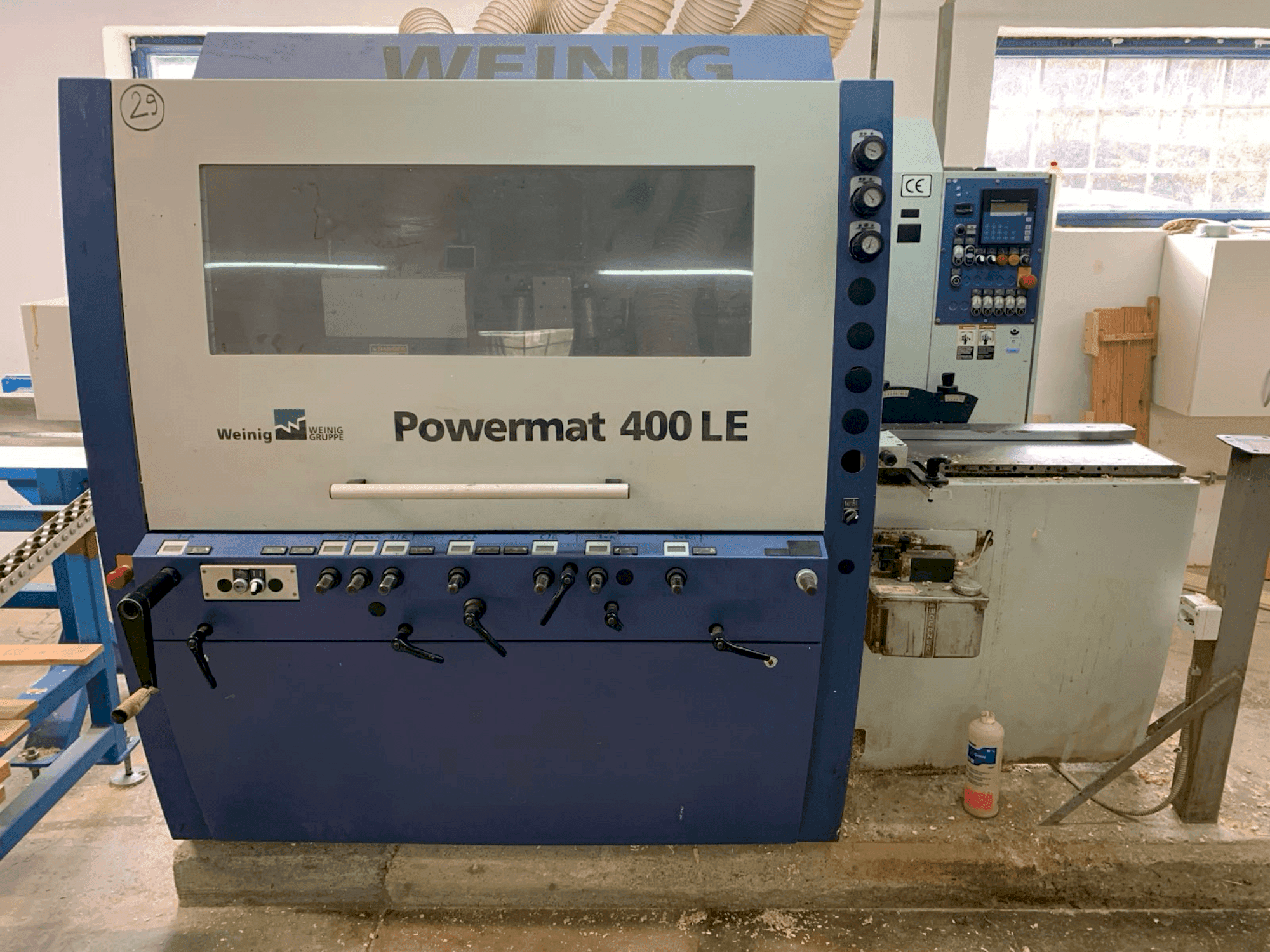 Vista frontal de la máquina WEINIG / DIMTER POWERMAT 400LE