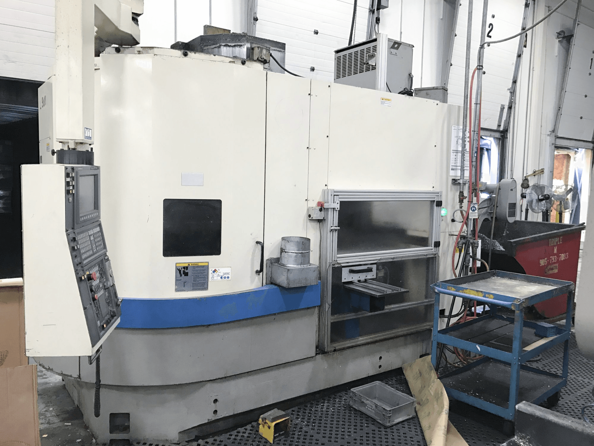 Vista izquierda de la máquina Okuma LVT 400