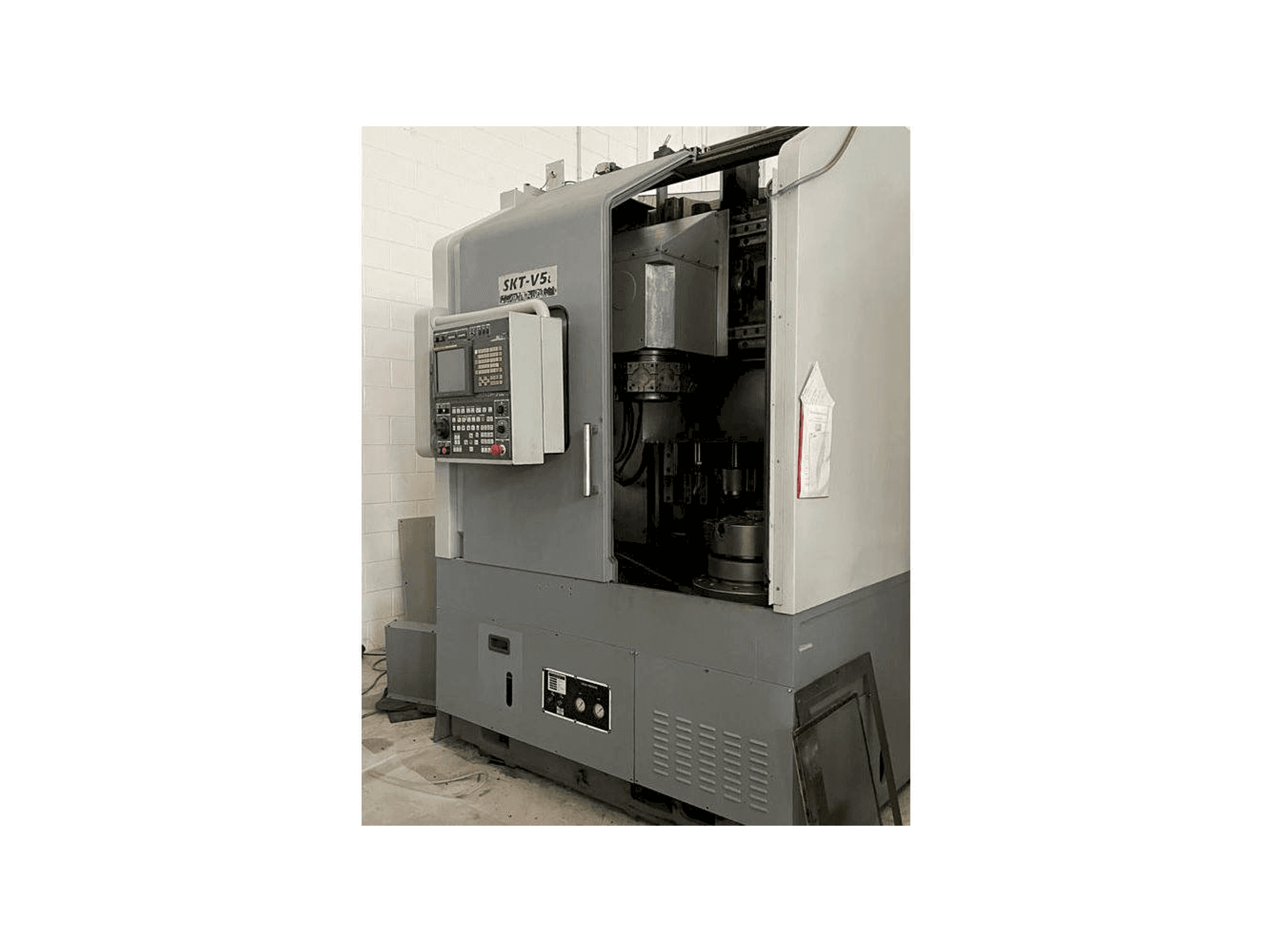 Vista derecha de la máquina Hyundai SKT V5L