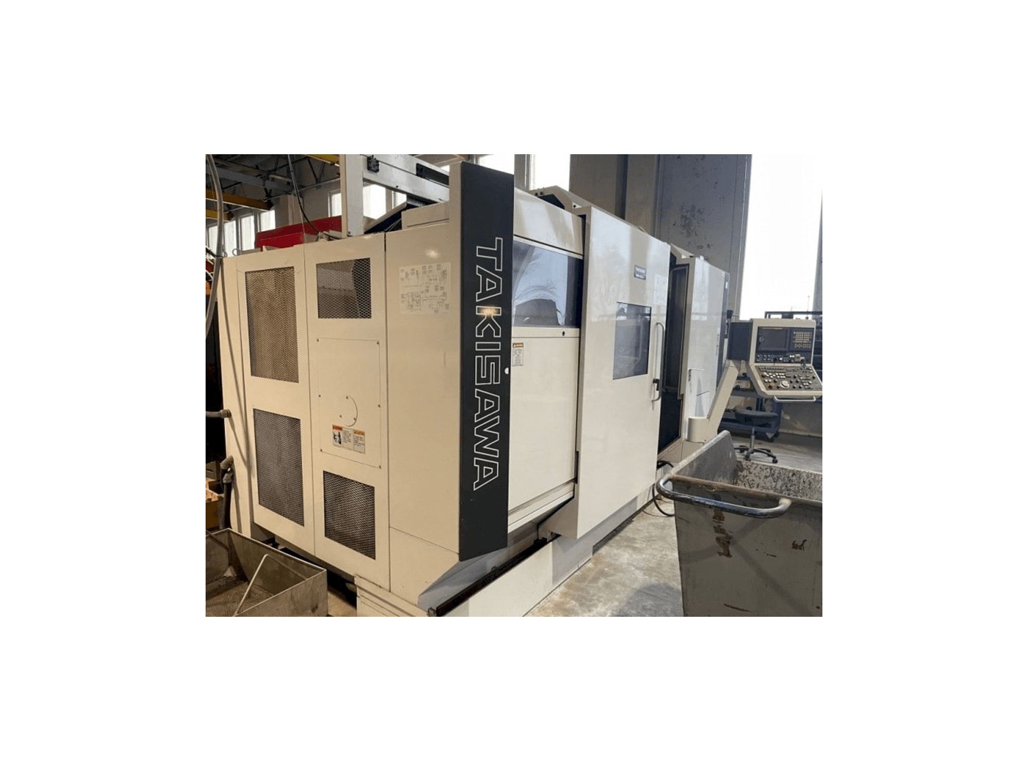 Vista frontal de la máquina Takisawa TMM250-M3