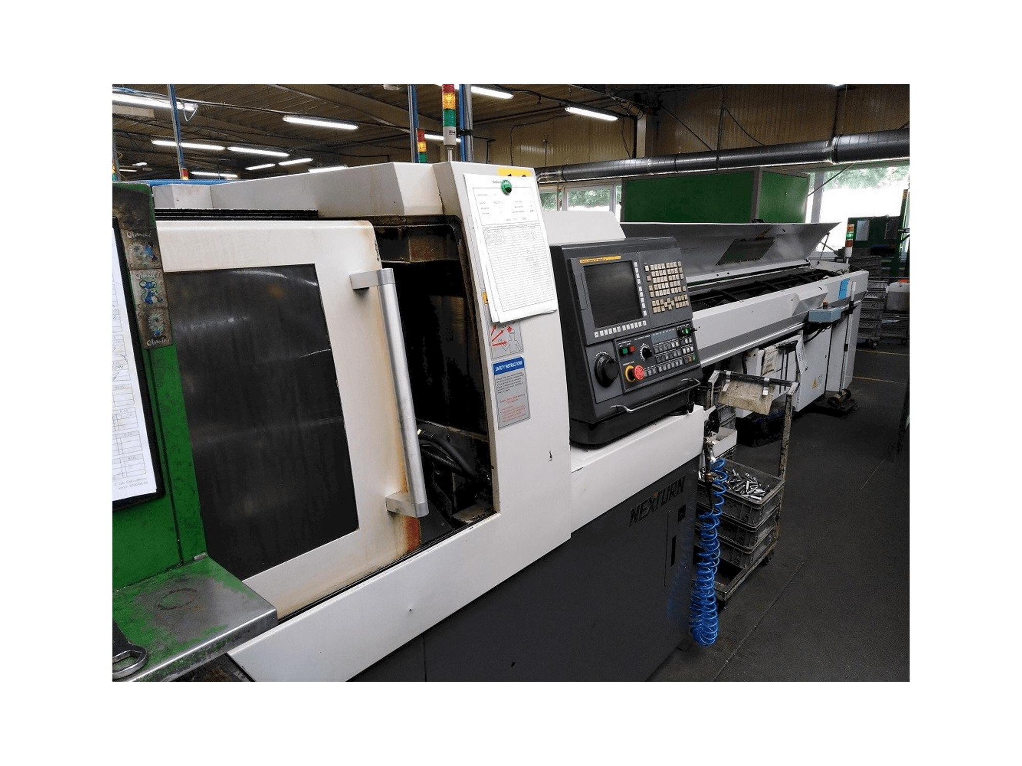 Vista frontal de la máquina Nexturn SA-20E