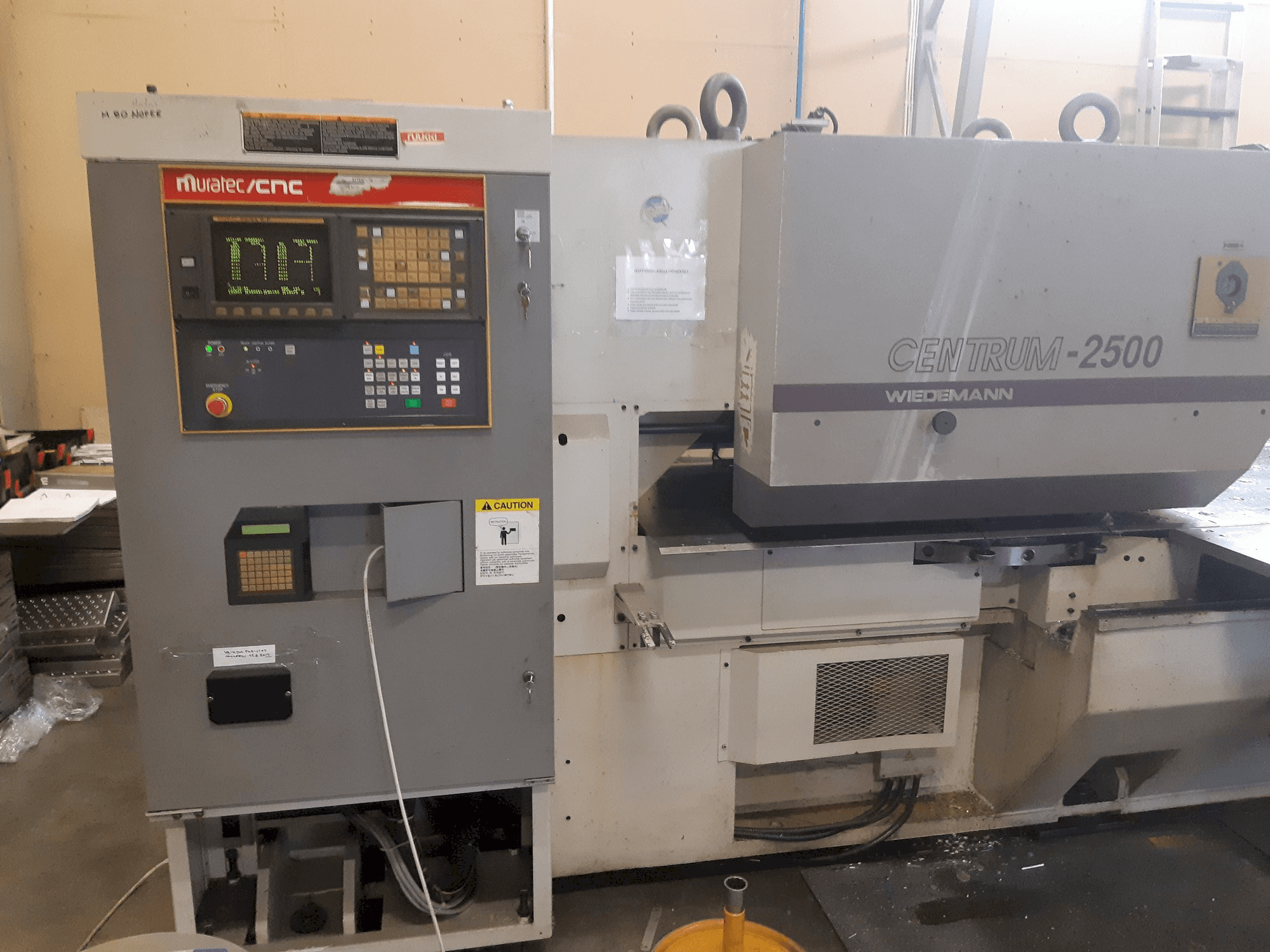 Vista frontal de la máquina Murata Wiedemann C-2500