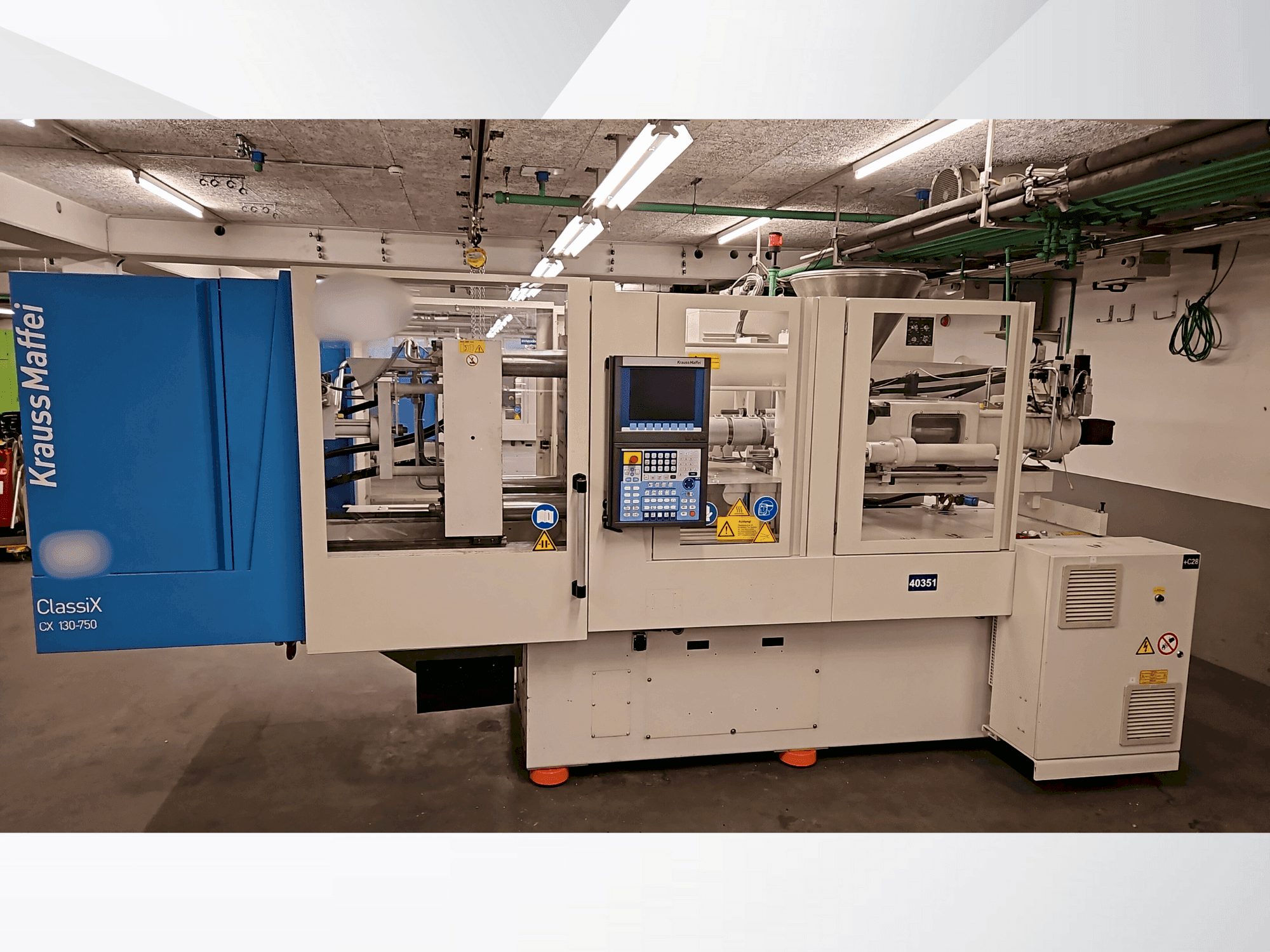 Vista frontal de la máquina Krauss Maffei 130-750 CX
