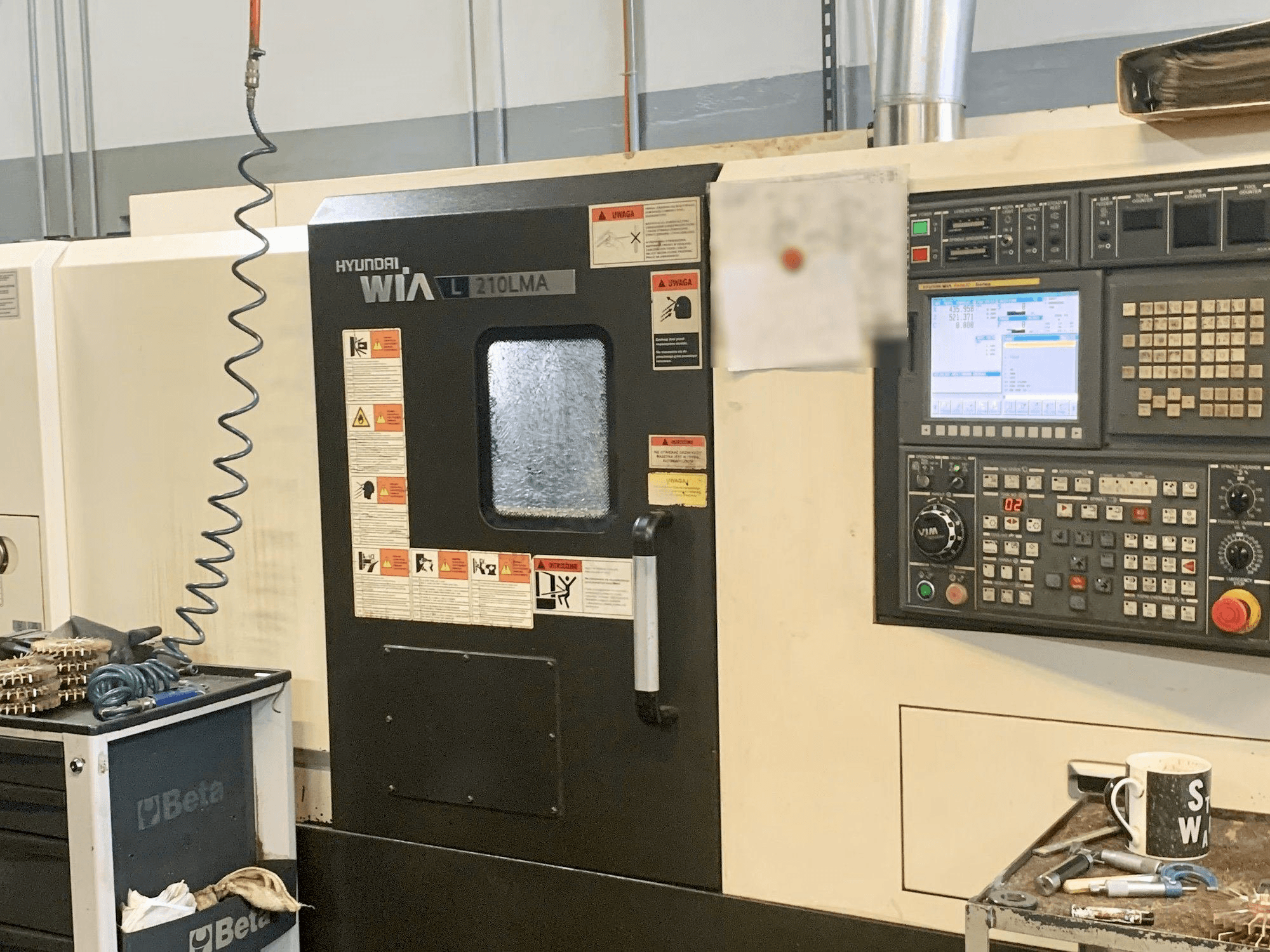 Vista frontal de la máquina Hyundai Wia L210LMA