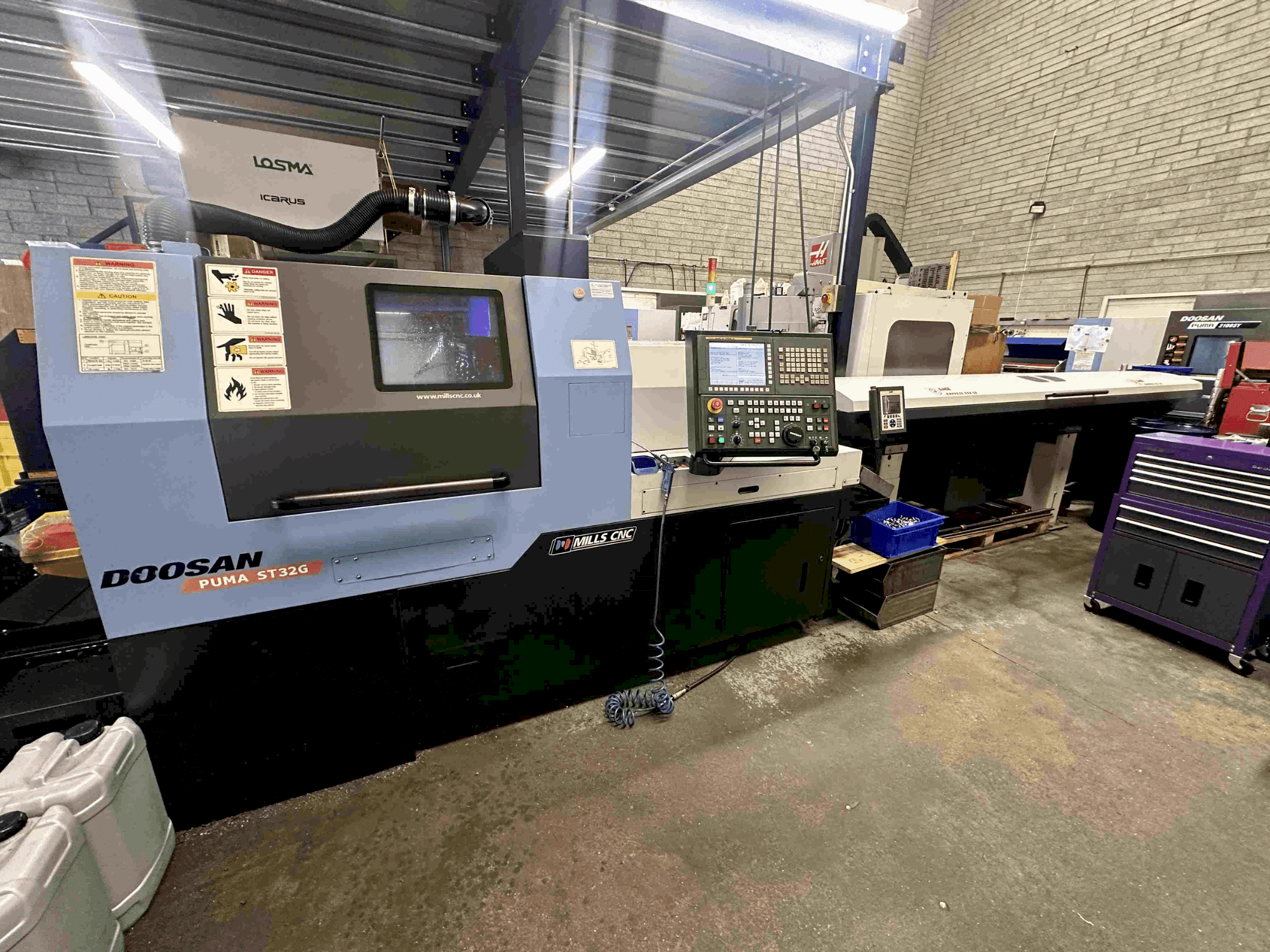 Vista frontal de la máquina DOOSAN Puma ST32G
