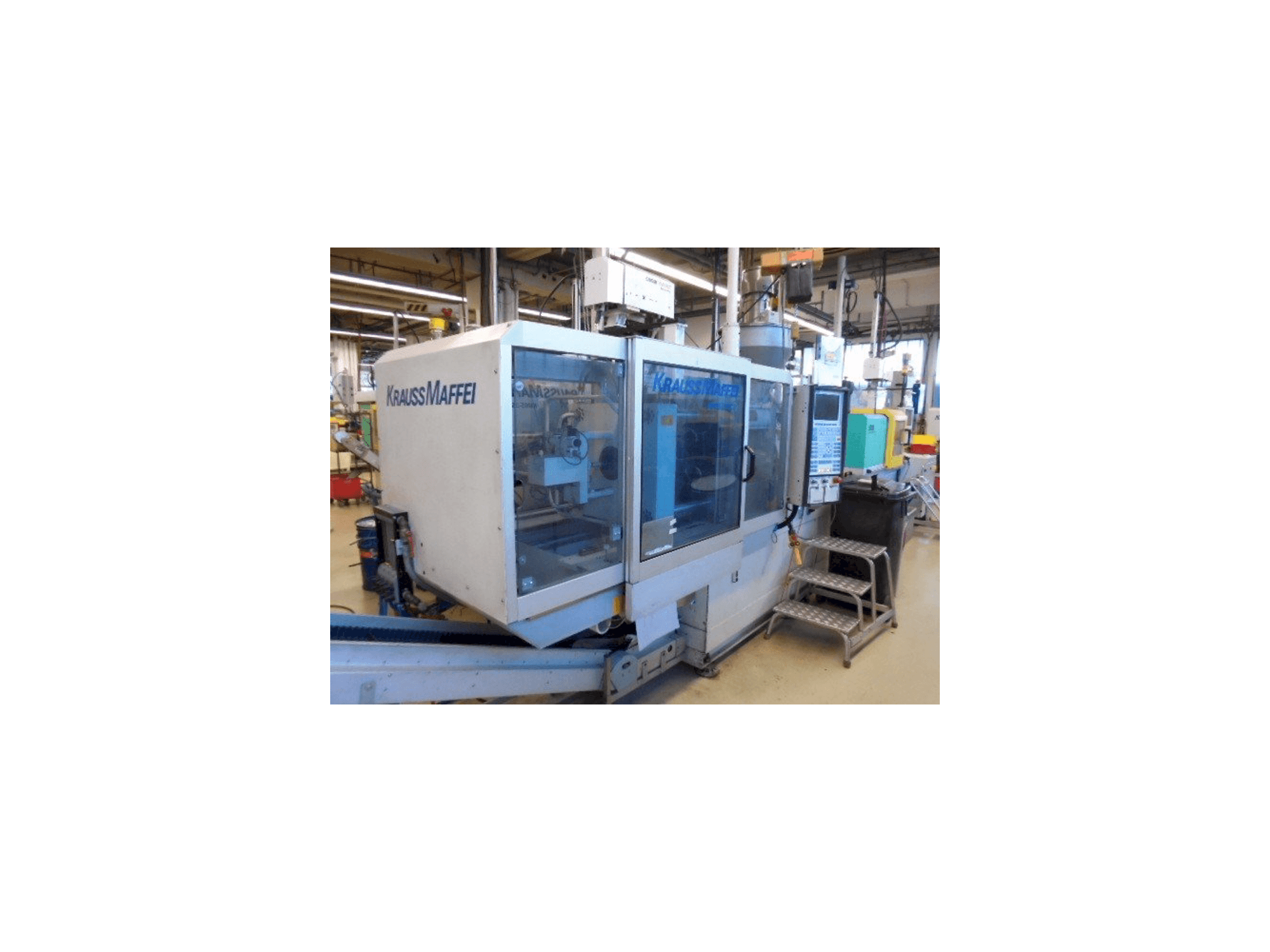 Vista lateral izquierda de la máquina Krauss Maffei KM 65-390-C2