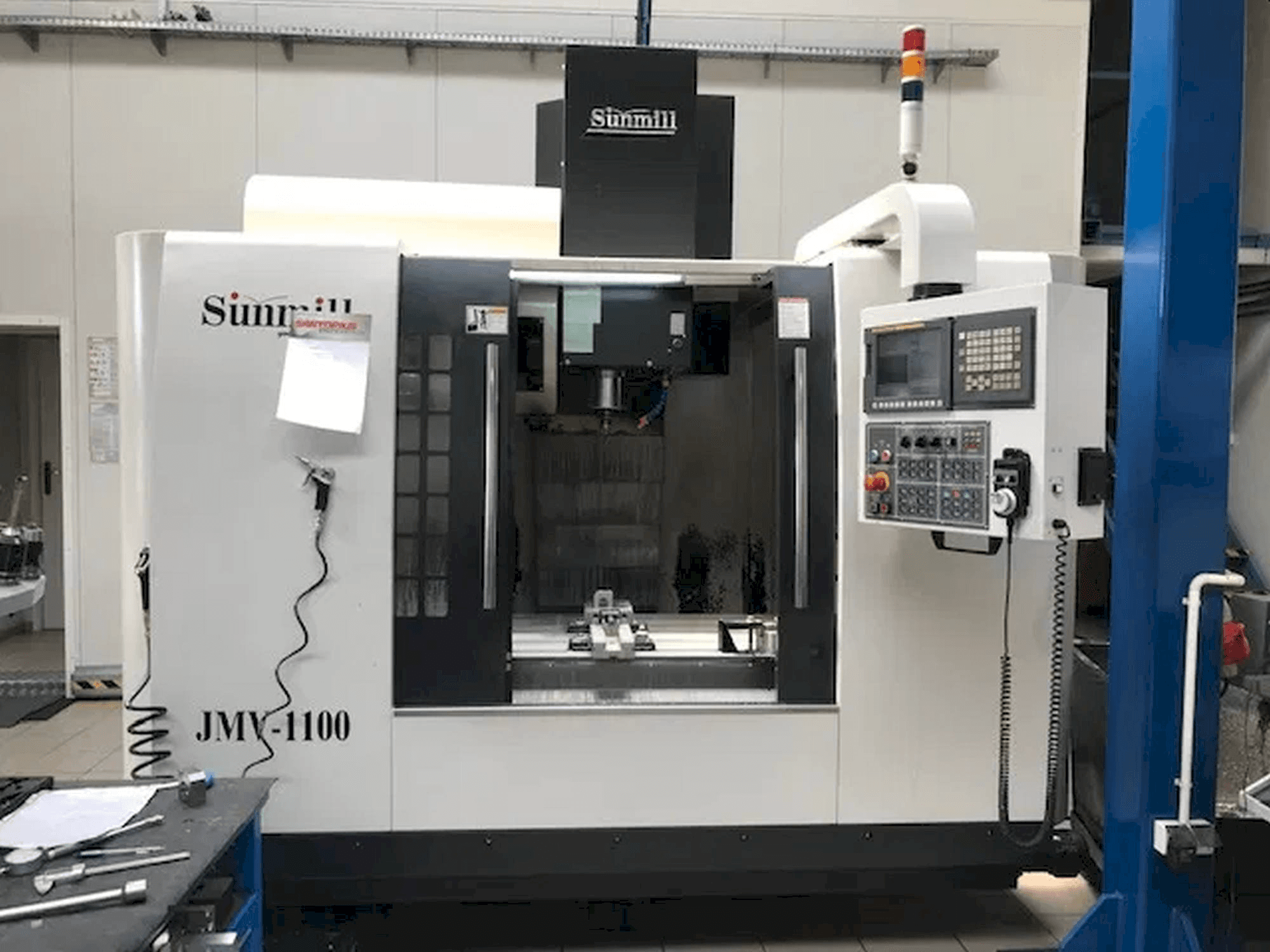 Vista frontal de la máquina SUNMILL JMV-1100