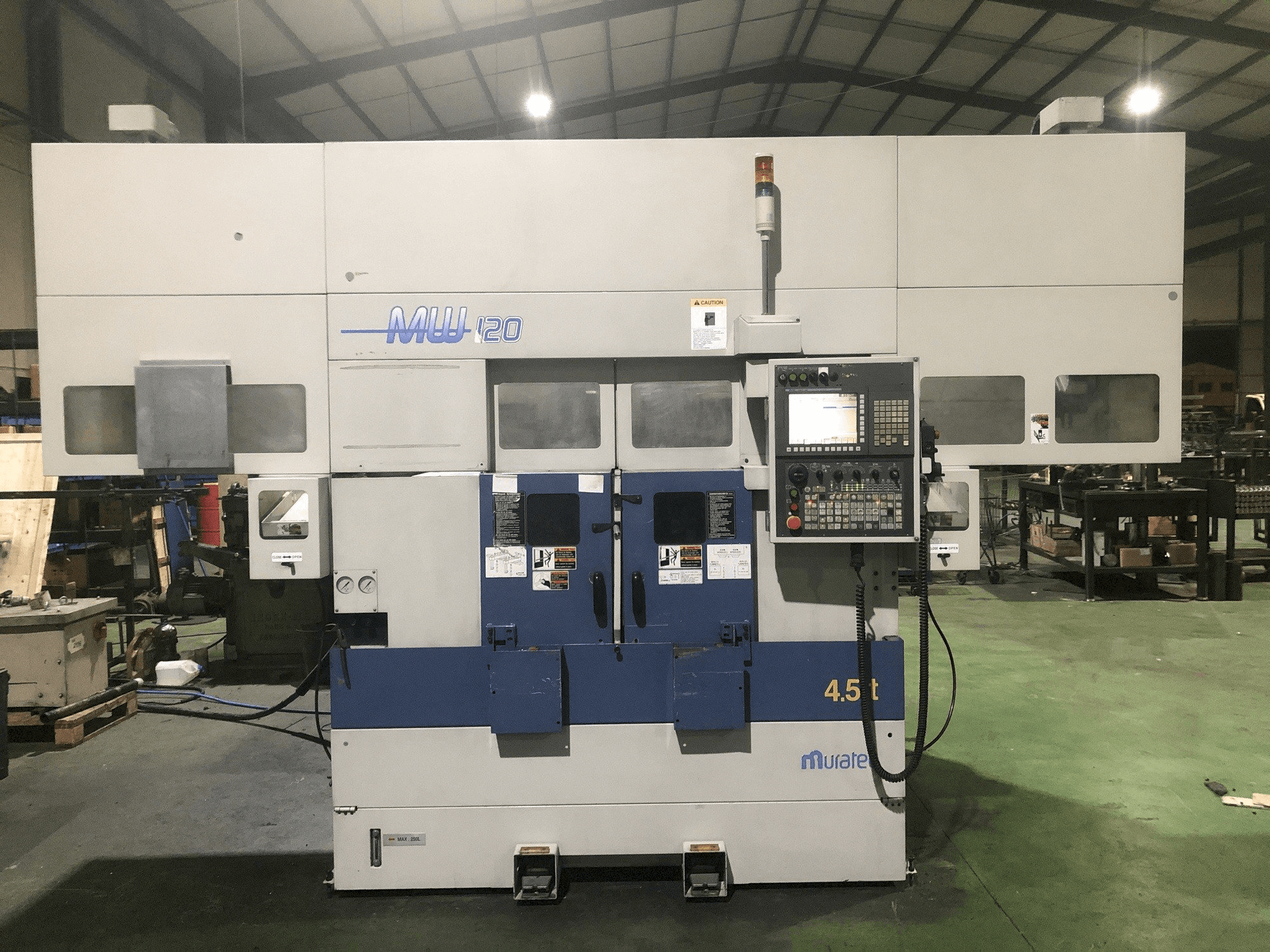 Vista frontal de la máquina Muratec MW 120 GT