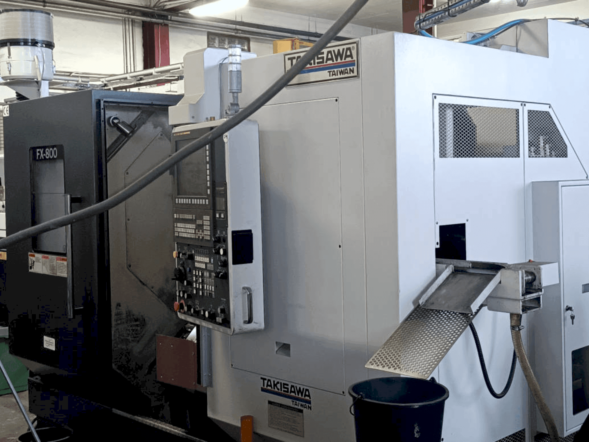 Vista frontal de la máquina Takisawa FX800