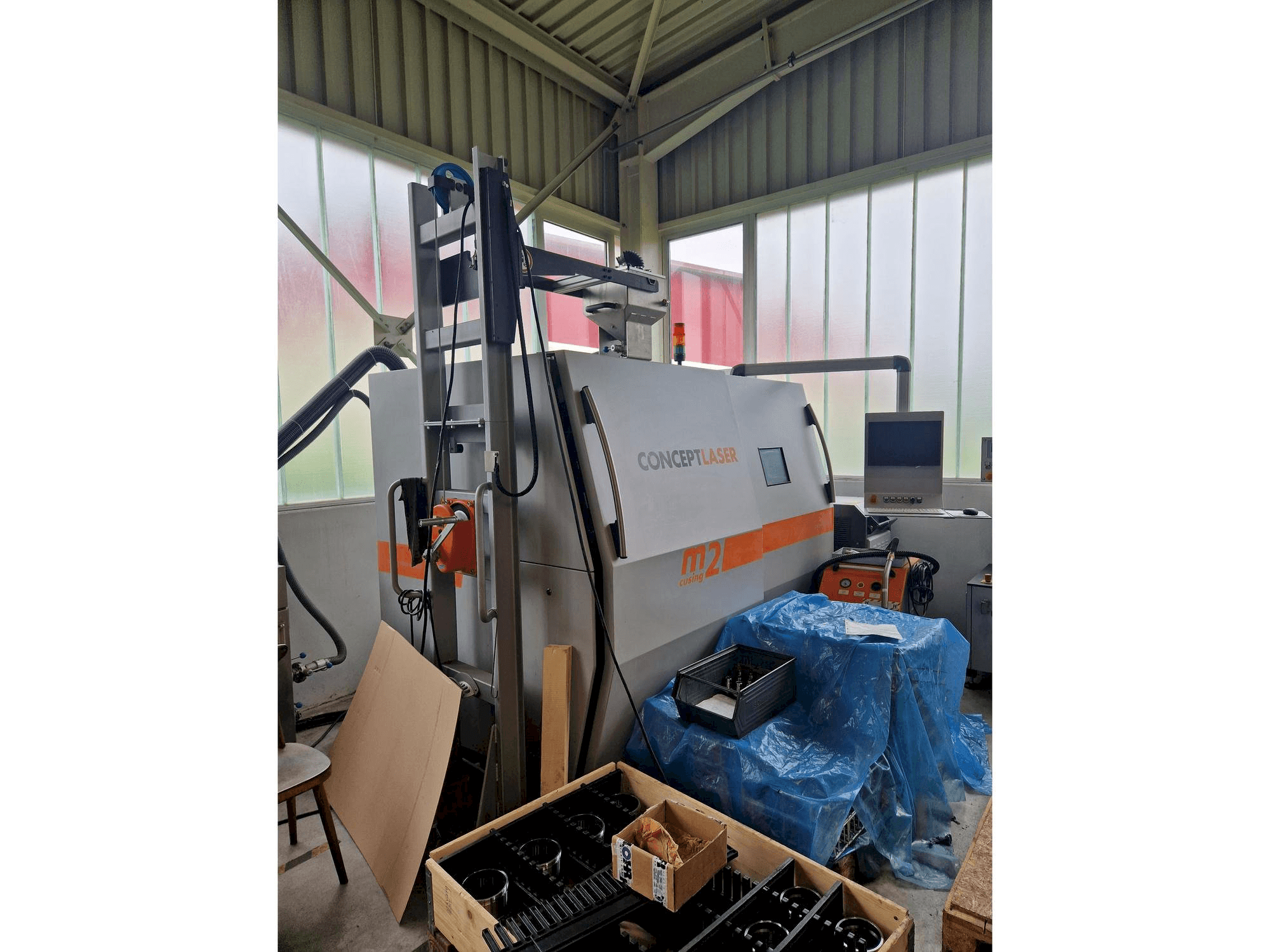 Vista frontal de la máquina CONCEPT LASER M2 cusing