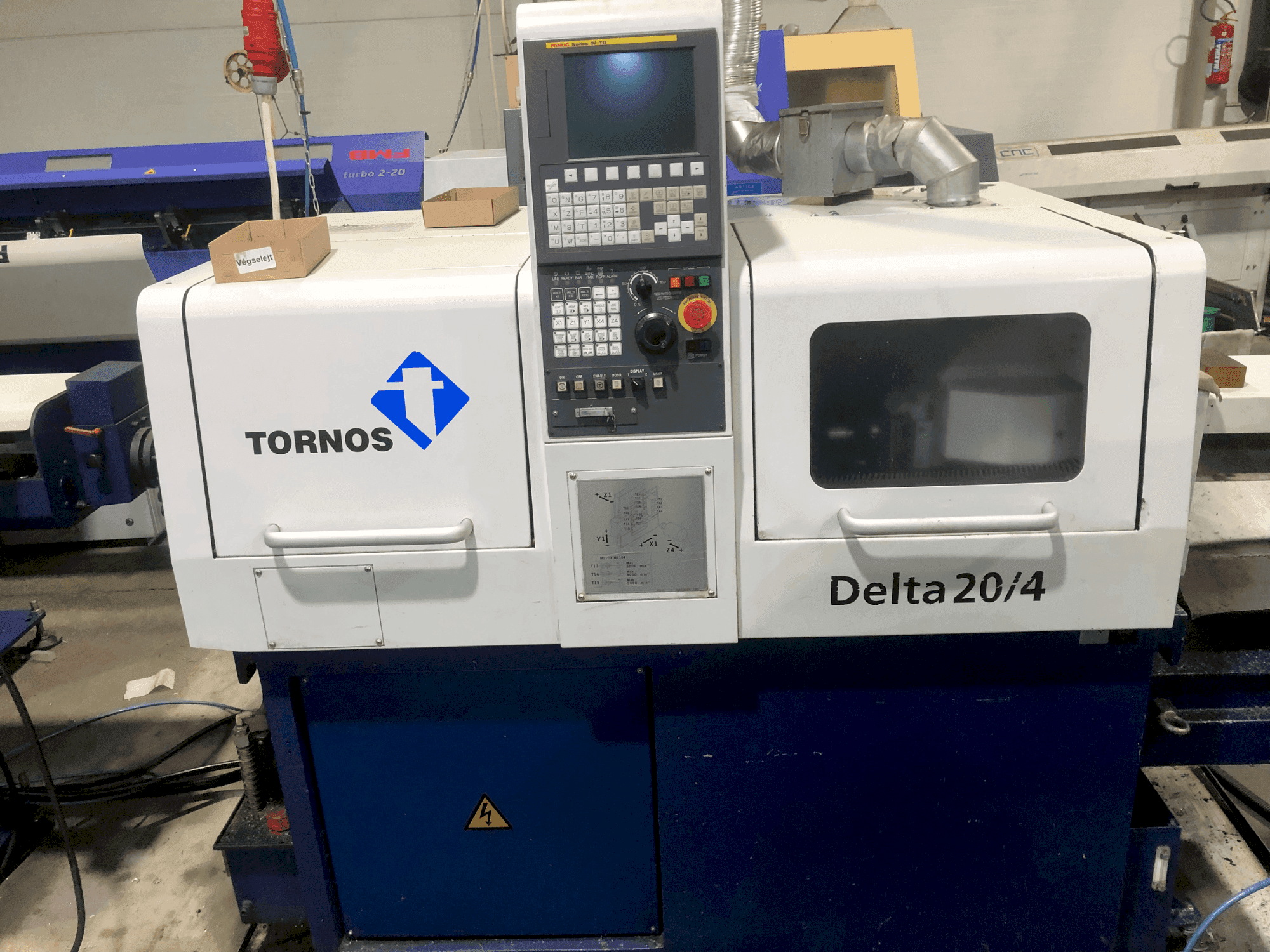 Vista frontal de la máquina TORNOS TORNOS DELTA 20/4