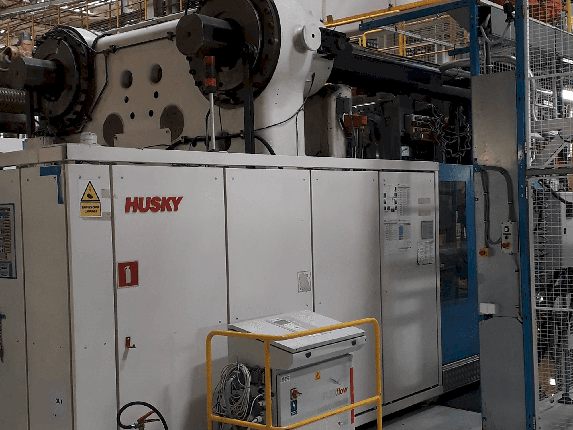 Vista frontal de la máquina Husky ELL2350 RS155/145