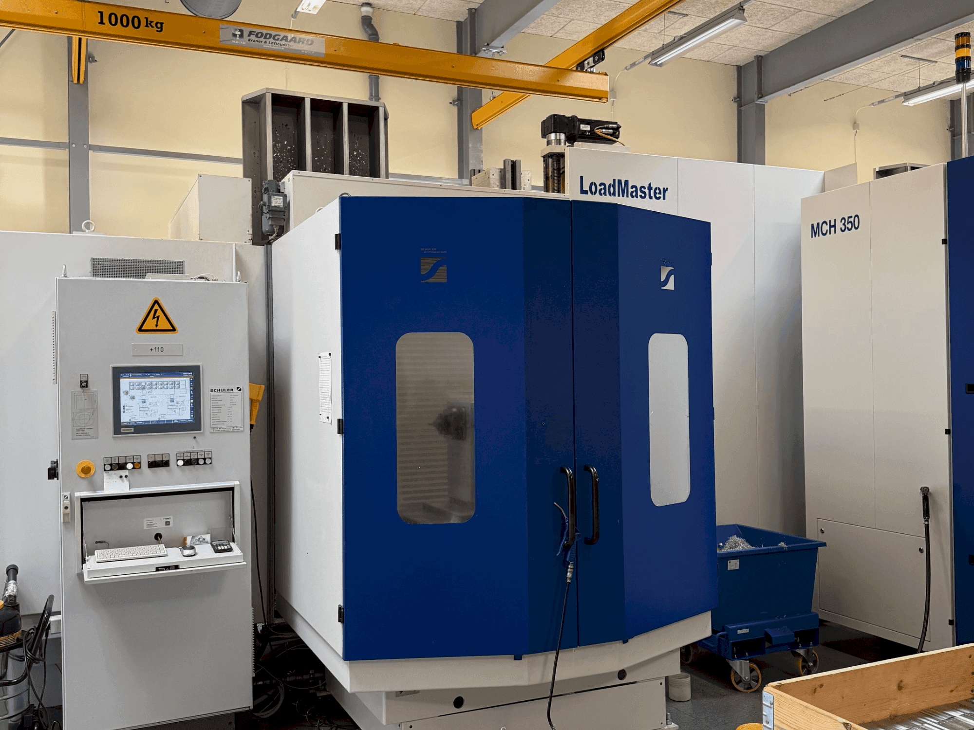 Vista frontal de la máquina HELLER MCH 300 + MCH 300 C + 22 pallet system