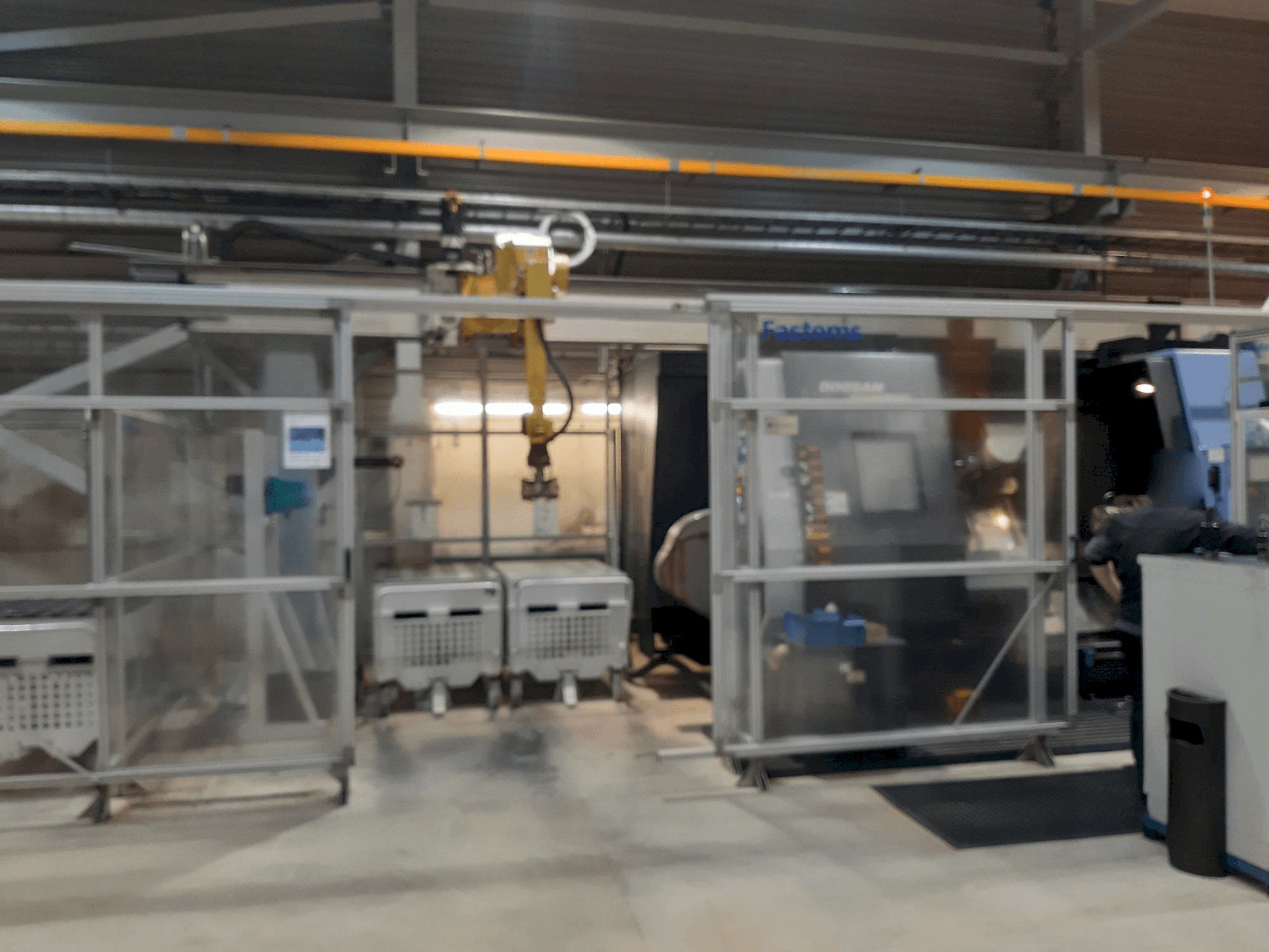 Vista frontal de la máquina Fastems RPC-70 with Fanuc M-710iC